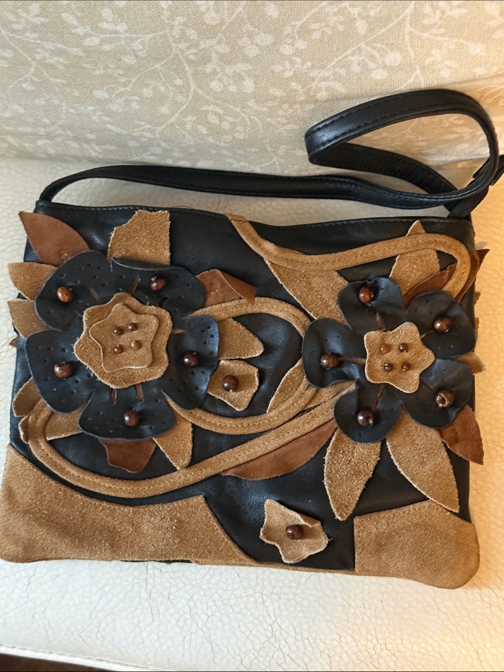 CHICOโS Leather Floral Appliquรฉ Hand Shoulder Bag with Wooden Beads